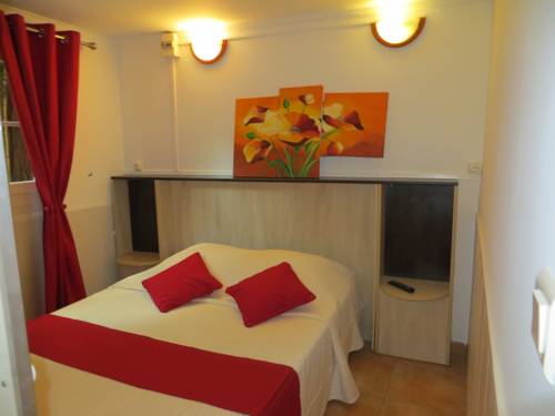 Imagen de la habitación del Hotel Le Mas De La Frigoulette. Foto 11