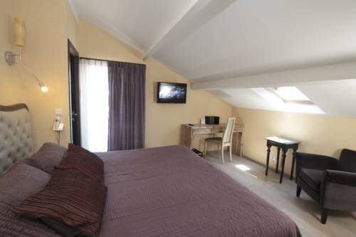 Imagen de la habitación del Hotel Le Mas Des Carassins. Foto 12