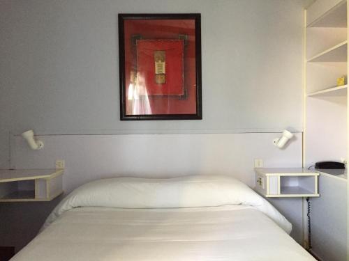 Imagen de la habitación del Hotel Le Mas Des Lilas. Foto 8