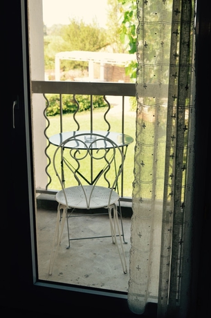 Imagen de la habitación del Hotel Le Mas Des Ponts D'arles. Foto 4