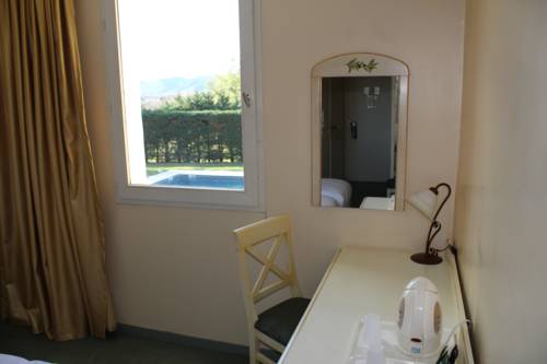 Imagen de la habitación del Hotel Le Mas Du Colombier. Foto 8