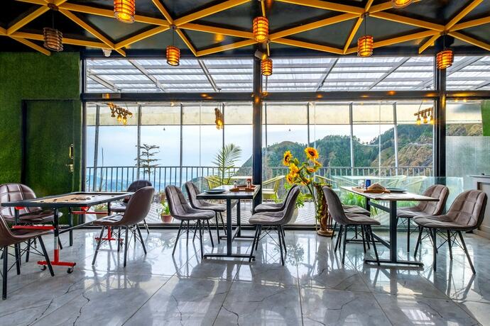 Imagen del bar/restaurante del Hotel Le Masrana Inn. Foto 9