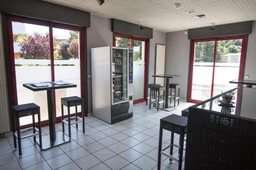 Imagen de la habitación del Hotel Le Médicis, Roussillon-en-Isere. Foto 8