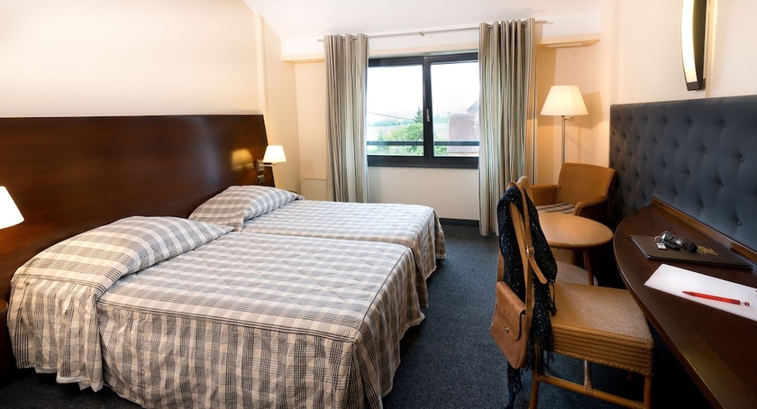 Imagen de la habitación del Hotel Le Ménestrel. Foto 10