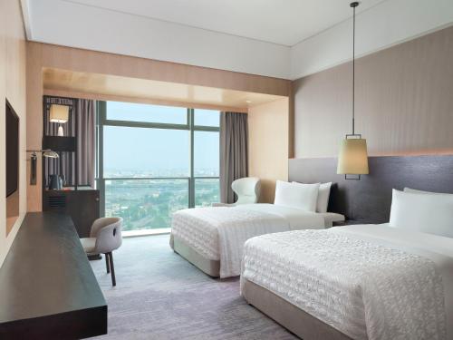 Imagen de la habitación del Hotel Le M&eacute;ridien Zhongshan. Foto 4
