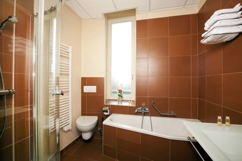 Imagen de la habitación del Hotel Le M&eacute;tropole. Foto 6