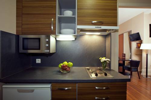 Imagen de la habitación del Hotel Le M&eacute;tropole. Foto 8
