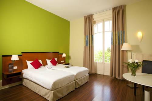 Imagen de la habitación del Hotel Le M&eacute;tropole. Foto 11