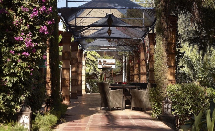 Imagen del bar/restaurante del Hotel Le Meridien N'fis. Foto 4