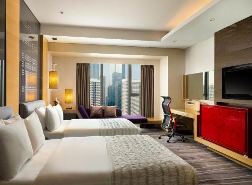 Imagen de la habitación del Hotel Le Meridien Qingdao. Foto 7