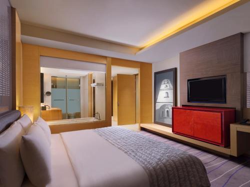 Imagen de la habitación del Hotel Le Meridien Qingdao. Foto 10