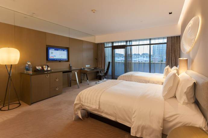 Imagen de la habitación del Hotel Le Meridien Qingdao West Coast Resort. Foto 9