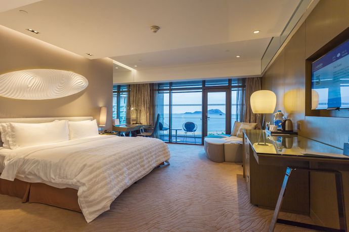 Imagen de la habitación del Hotel Le Meridien Qingdao West Coast Resort. Foto 10