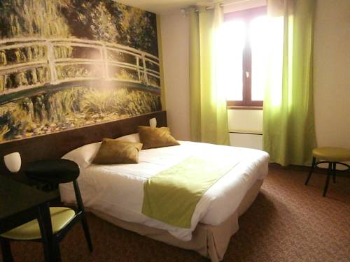 Imagen de la habitación del Hotel Le Merle Blanc. Foto 3