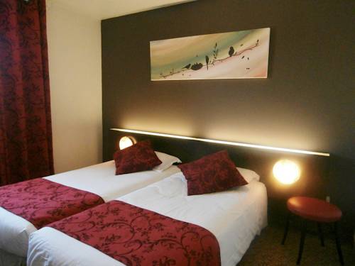 Imagen de la habitación del Hotel Le Merle Blanc. Foto 11