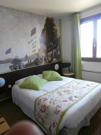 Imagen de la habitación del Hotel Le Merle Blanc. Foto 13