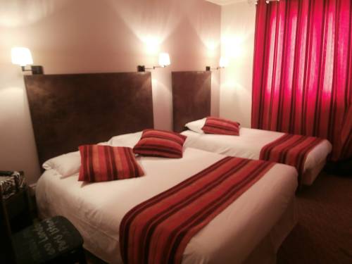 Imagen de la habitación del Hotel Le Merle Blanc. Foto 15