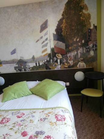 Imagen de la habitación del Hotel Le Merle Blanc. Foto 16