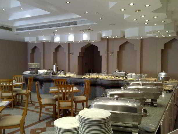 Imagen del bar/restaurante del Hotel Le Mirage New Tiran. Foto 4