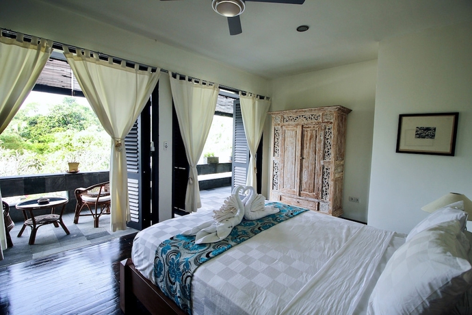Imagen de la habitación del Hotel Le Mirage Villa Santai. Foto 9
