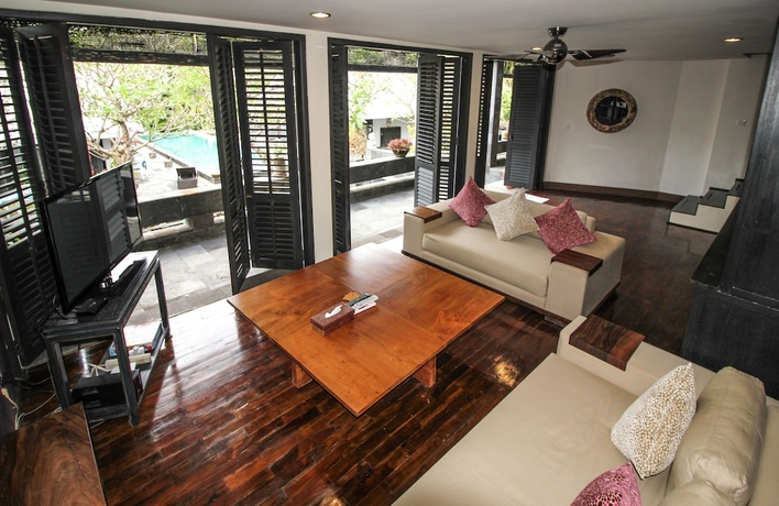 Imagen de la habitación del Hotel Le Mirage Villa Santai. Foto 12