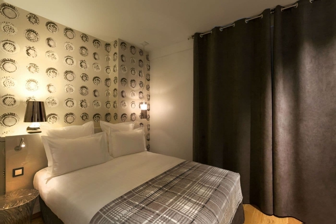 Imagen de la habitación del Hotel Le Mireille. Foto 14