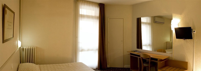 Imagen de la habitación del Hotel Le Moderne. Foto 4