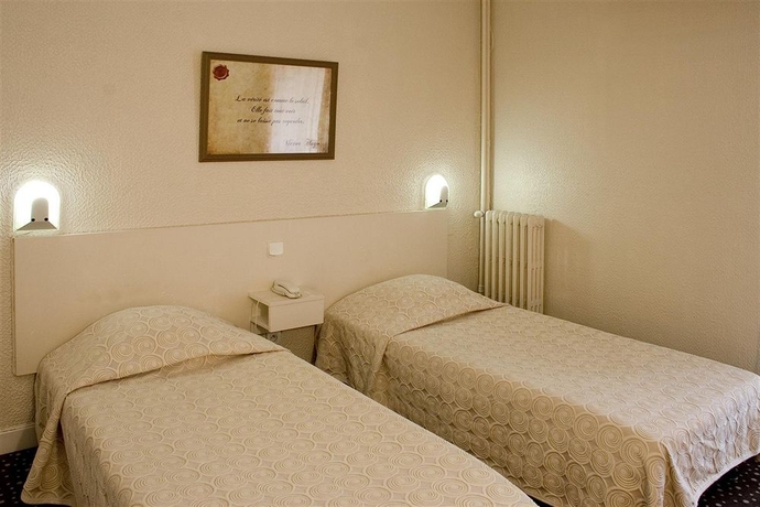 Imagen de la habitación del Hotel Le Moderne. Foto 5