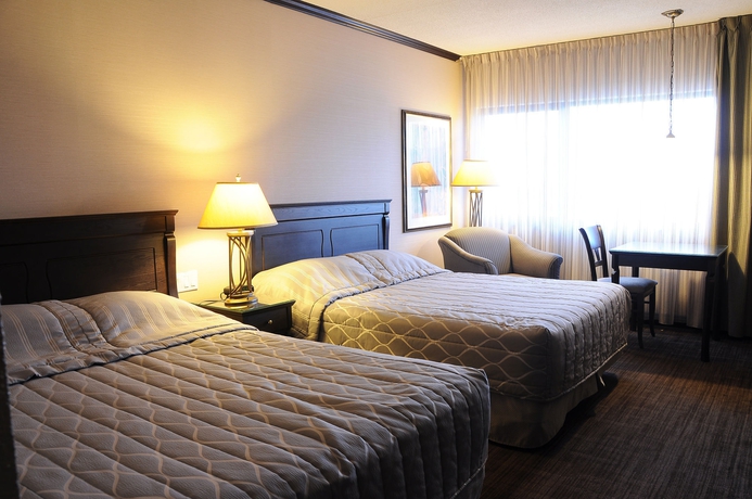 Imagen de la habitación del Hotel Le Montagnais. Foto 6