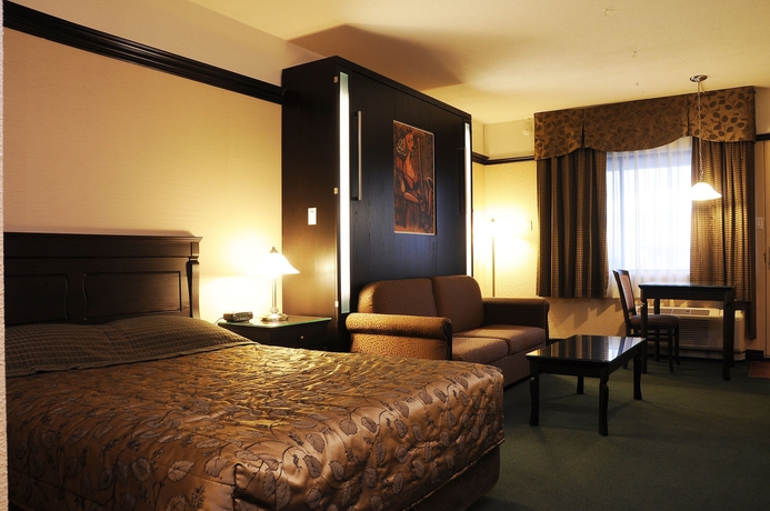 Imagen de la habitación del Hotel Le Montagnais. Foto 7