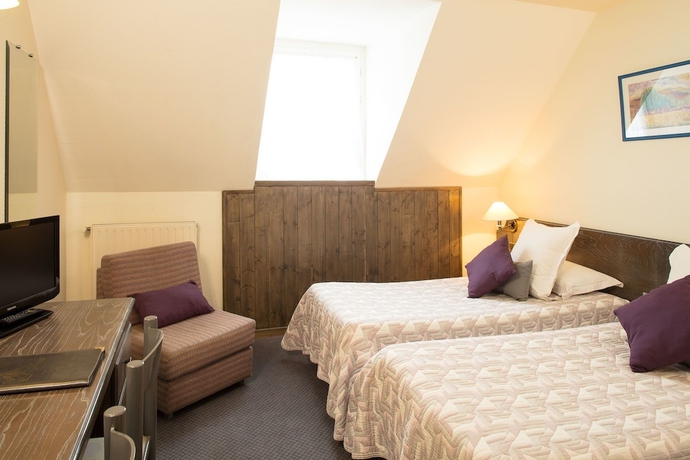 Imagen de la habitación del Hotel Le Montaigu. Foto 8