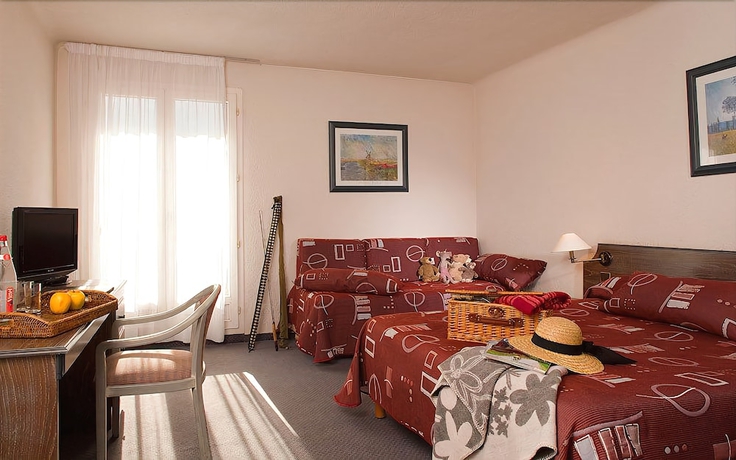 Imagen de la habitación del Hotel Le Montaigu. Foto 12