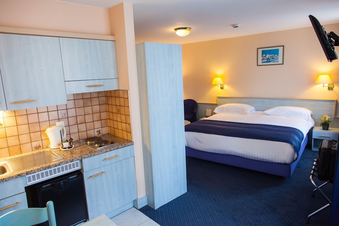 Imagen de la habitación del Hotel Le Montbrillant Residence. Foto 6