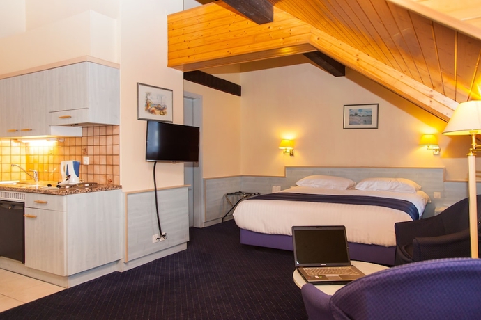 Imagen de la habitación del Hotel Le Montbrillant Residence. Foto 8