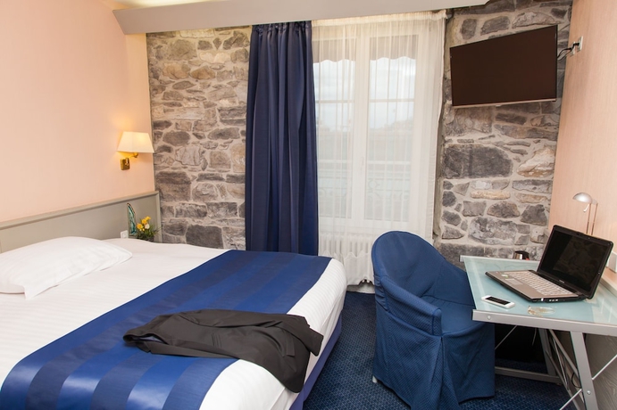 Imagen de la habitación del Hotel Le Montbrillant Residence. Foto 10