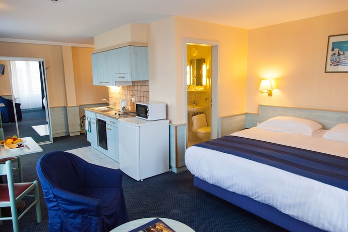 Imagen de la habitación del Hotel Le Montbrillant Residence. Foto 12