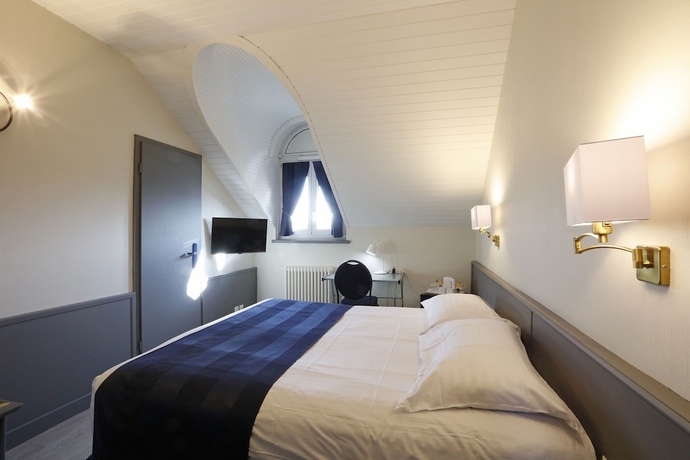 Imagen de la habitación del Hotel Le Montbrillant Residence. Foto 16