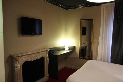 Imagen de la habitación del Hotel Le Montmartre Saint Pierre. Foto 4