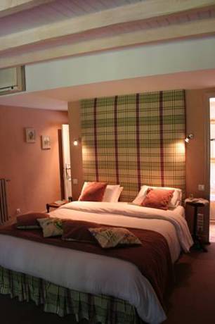 Imagen de la habitación del Hotel Le Moulin Du Roc. Foto 7