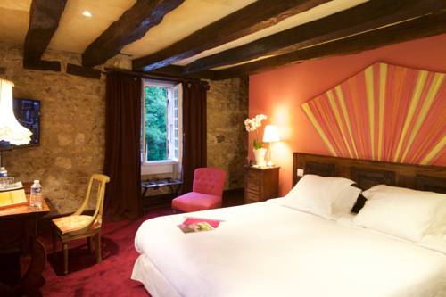 Imagen de la habitación del Hotel Le Moulin Du Roc. Foto 9