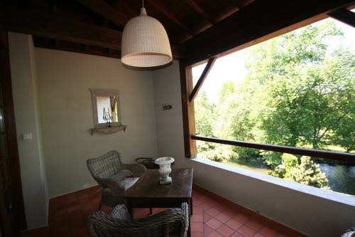 Imagen de la habitación del Hotel Le Moulin Du Roc. Foto 11