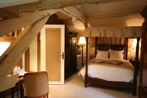 Imagen de la habitación del Hotel Le Moulin Du Roc. Foto 12
