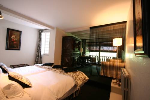 Imagen de la habitación del Hotel Le Moulin Du Roc. Foto 13