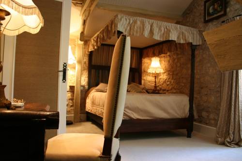 Imagen de la habitación del Hotel Le Moulin Du Roc. Foto 16