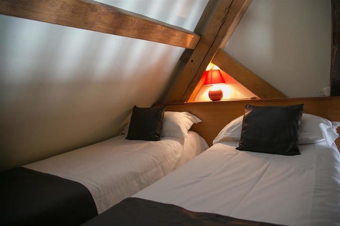 Imagen de la habitación del Hotel Le Mouton Blanc, Le Mont-Saint-Michel. Foto 11