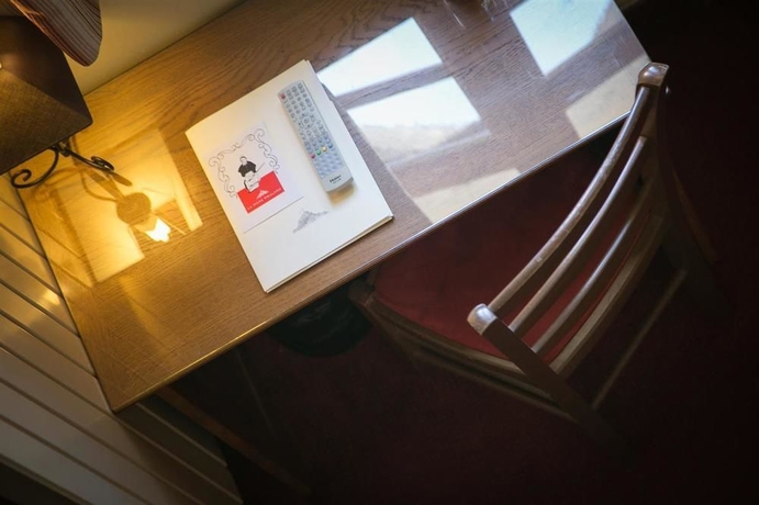 Imagen de la habitación del Hotel Le Mouton Blanc, Le Mont-Saint-Michel. Foto 12