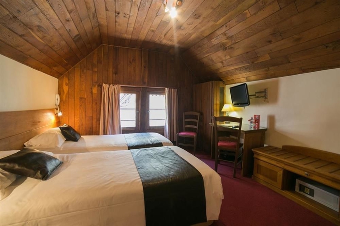 Imagen de la habitación del Hotel Le Mouton Blanc, Le Mont-Saint-Michel. Foto 13