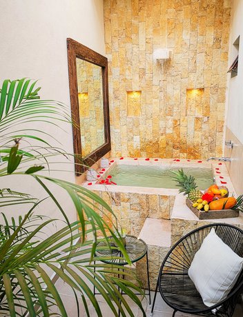 Imagen de la habitación del Hotel Le Muuch. Foto 11