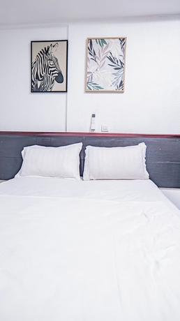 Imagen de la habitación del Hotel Le Nid Resort. Foto 1