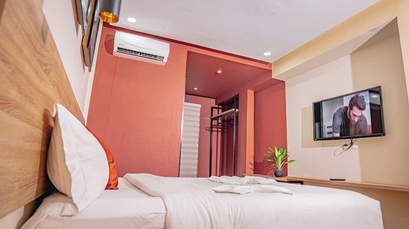 Imagen de la habitación del Hotel Le Nid Resort. Foto 10
